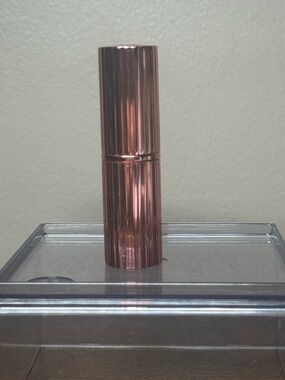 Charlotte Tilbury 
K.I.S.S.I.N.G Satin Shine Lipstick candy chic